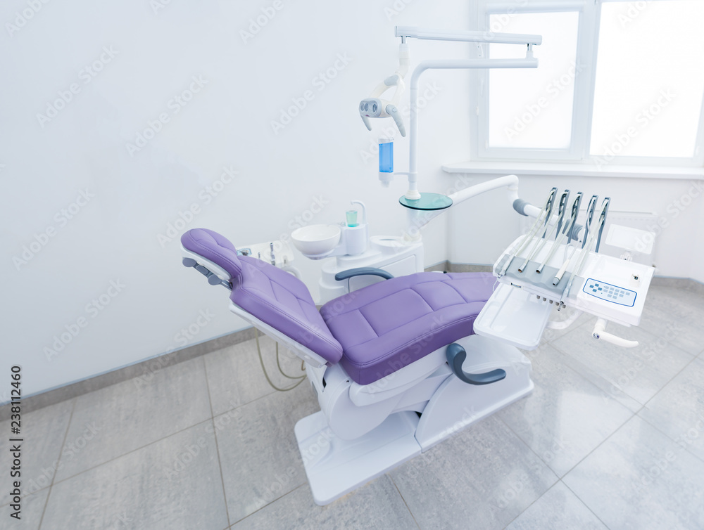 dental ordination cabinet purple chair modern clinic wide angle