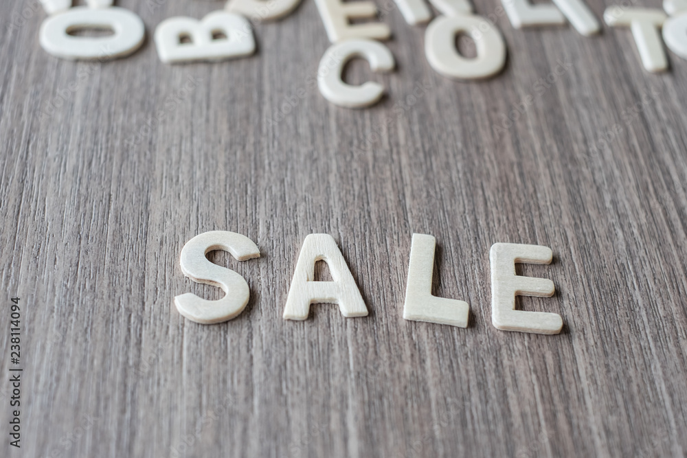 SALE word of wooden alphabet letters. Business and Idea concept SALE word of wooden alphabet letters. Business and Idea concept