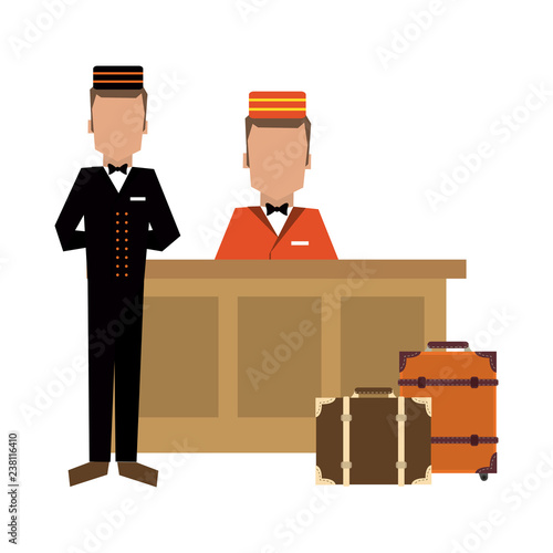 Bellboy with luggage at reception