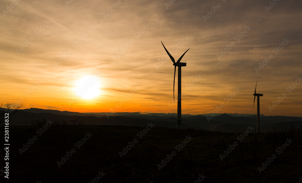 Dusk on Mount Oiz, Basque Country, with wind energy gathering Dusk on Mount Oiz, Basque Country, with wind energy gathering