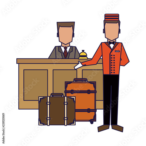 Bellboy with luggage at reception