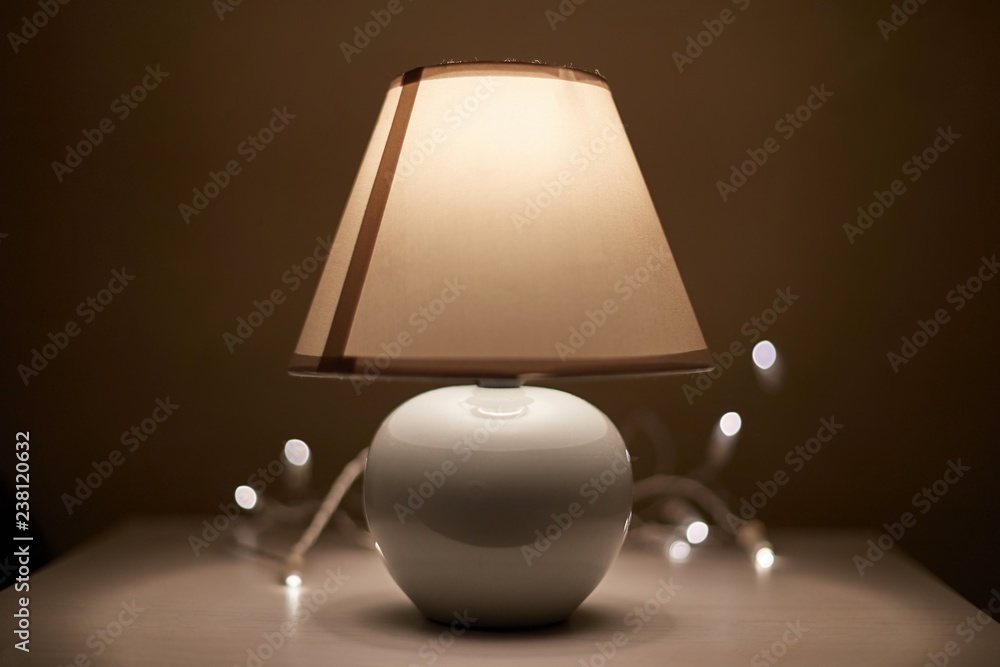 Lamp on a nightstand Lamp on a nightstand