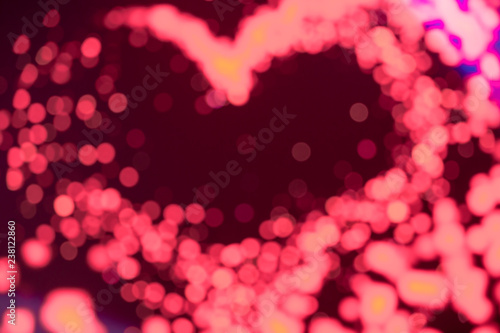 Heart shaped of disfocus of pink LED background