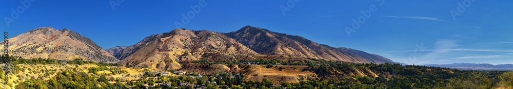 Logan Valley landscape views including Wellsville Mountains, Nibley, Hyrum, Providence and College Ward towns, home of Utah State University, in Cache County a branch of the Wasatch Range of the Rocky