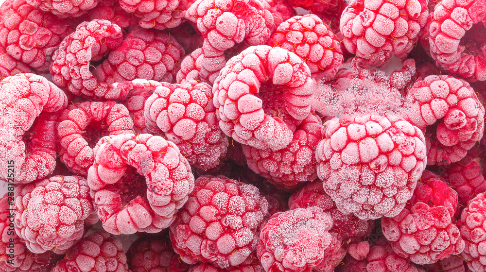 frozen raspberries isolated on white - obrazy, fototapety, plakaty 