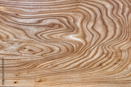 Slab table top of elm. Woodworking and carpentry production. Furniture manufacture