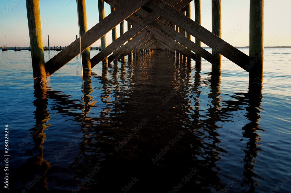 View beneath the pier at the Neuse River estuary at a park in Arapahoe North Carolina.