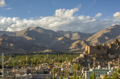 ancient tibetan palace fort in a mountain valley above the city