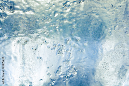 The texture of the ice. The frozen water.Winter background 