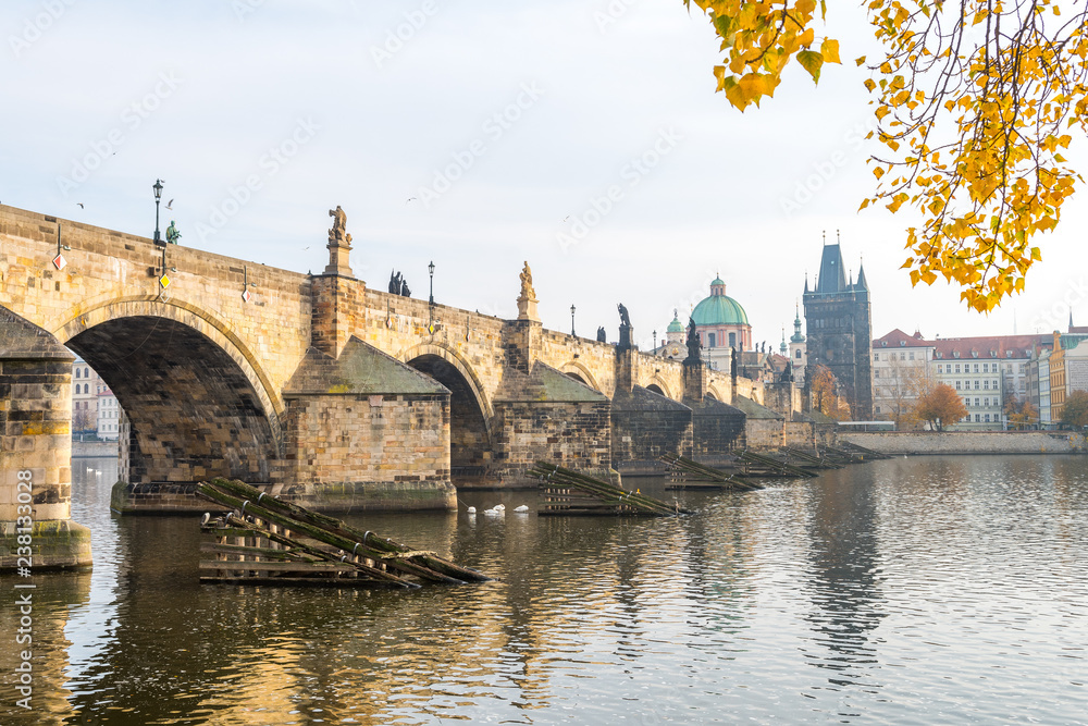 prague river bank and old town at background, czech republic prague river bank and old town at background, czech republic