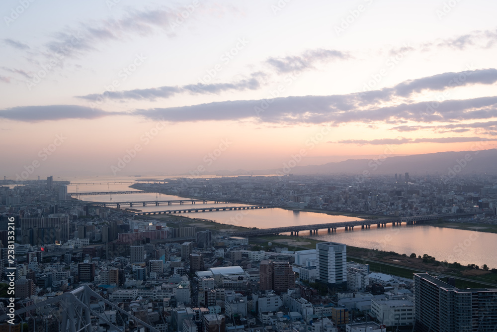 Fototapeta premium Aerial view of Osaka at sunset, Japan