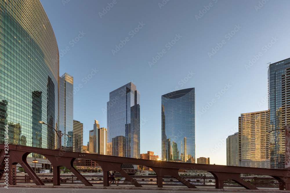 Fototapeta premium Skyscraper of Chicago downtown and Chicago River with bridges at sunset. Chicago, Illinois. 