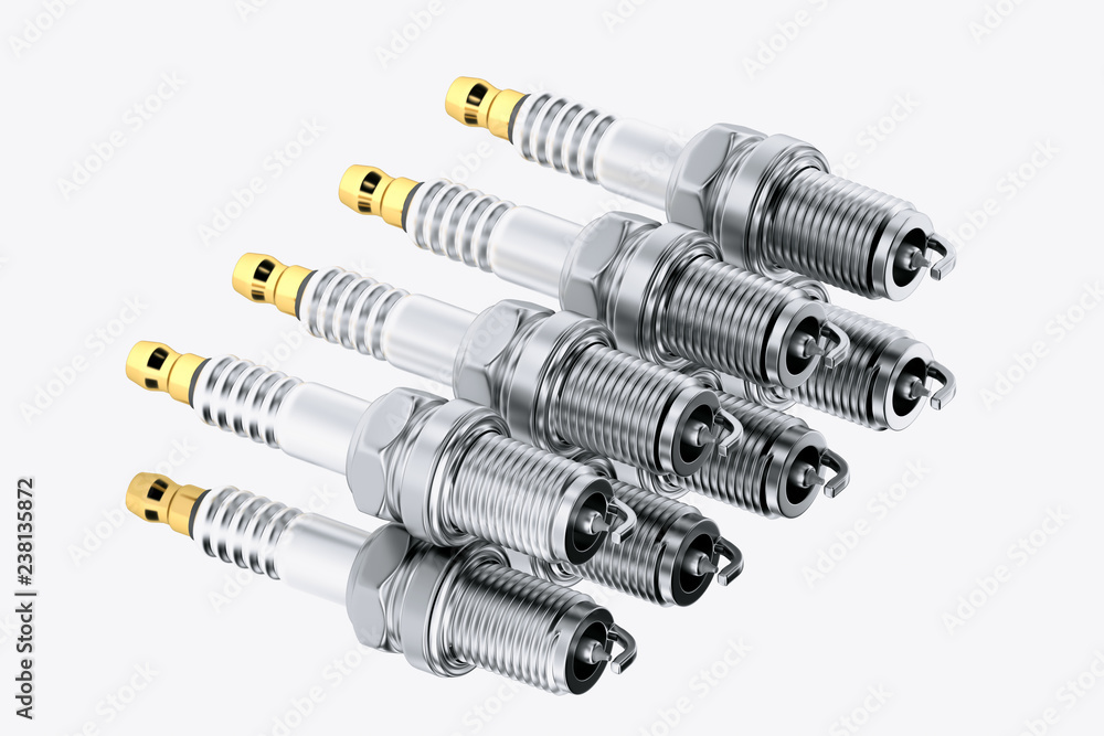 Spare parts spark plugs on white background for car and motorcycle. New auto parts spark plug. Spare parts spark plugs on white background for car and motorcycle. New auto parts spark plug.