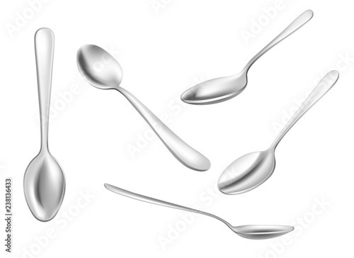 Set of realistic metal spoons