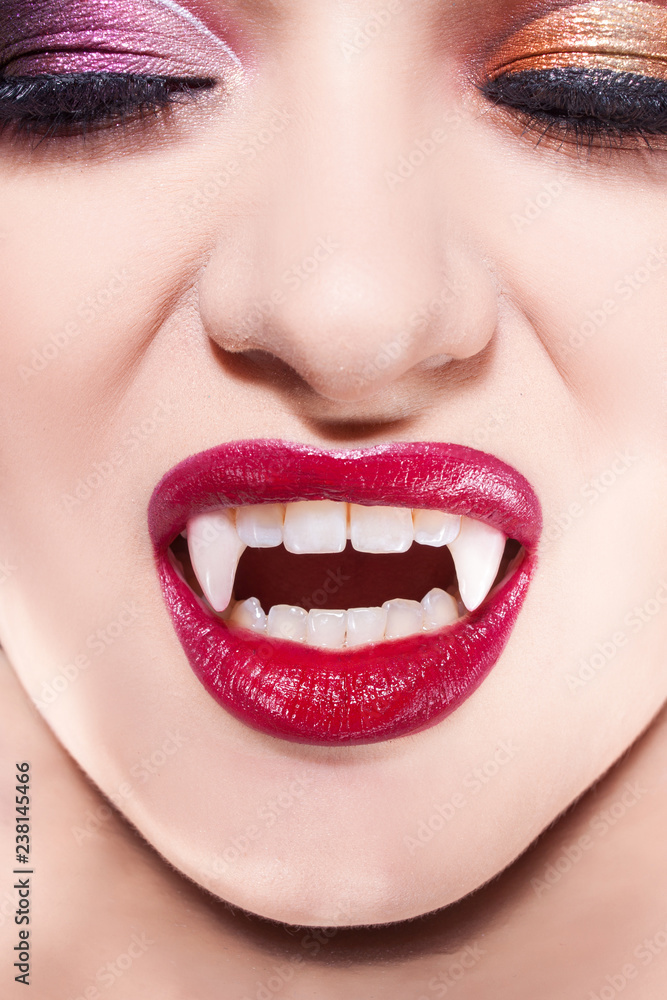 Obraz premium Sexy vampire. Women's lips with red lipstick.