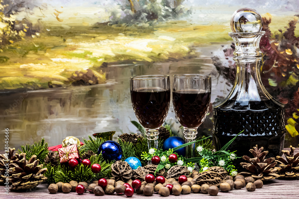 Christmas still life - walnuts, hazelnuts, red currants and red wine