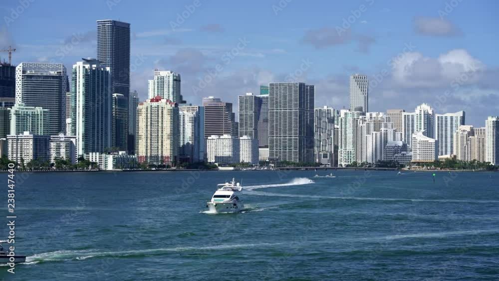 View at Miami's embankment and sailing boats on blue sky background View at Miami's embankment and sailing boats on blue sky background