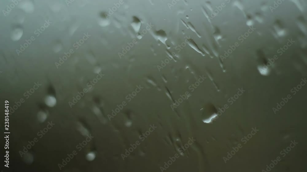 Drops of water run down the glass Drops of water run down the glass