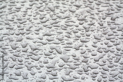 Water drops on car surface.