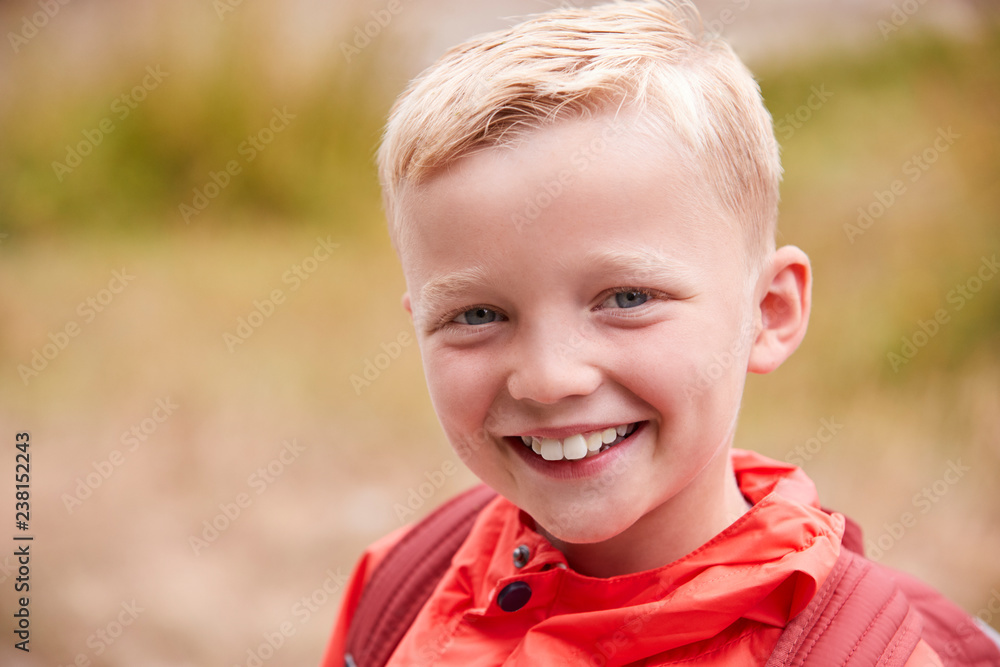 Portrait of pre-teen Caucasian boy outdoors, front view Portrait of pre-teen Caucasian boy outdoors, front view