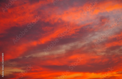 Beautiful bright colorful sky. Picture taken at sunset. Red-orange background with nice paints. Rare sunrise. Natural composition © es0lex