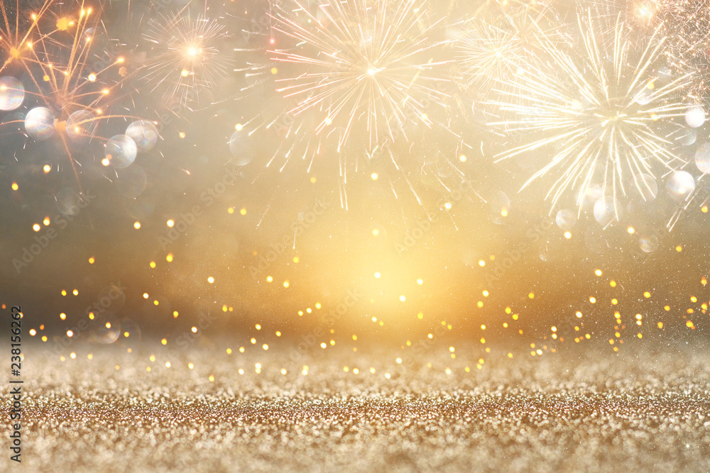 Fototapeta streszczenie tło złoto świecidełka z fajerwerkami. Wigilia, Nowy Rok i 4 lipca koncepcja wakacje.