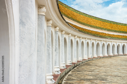 Buddhist religion architecture of Wat Phra Pathommachedi Ratcha Wora Maha Wihan. This temple is in Nakhon Pathom, Thailand, Southeast Asia. photo