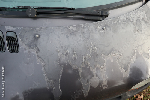 car hood paint worn by time and sun moon