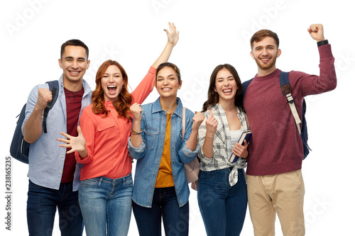 education, high school and people concept - group of happy students celebrating success over white background