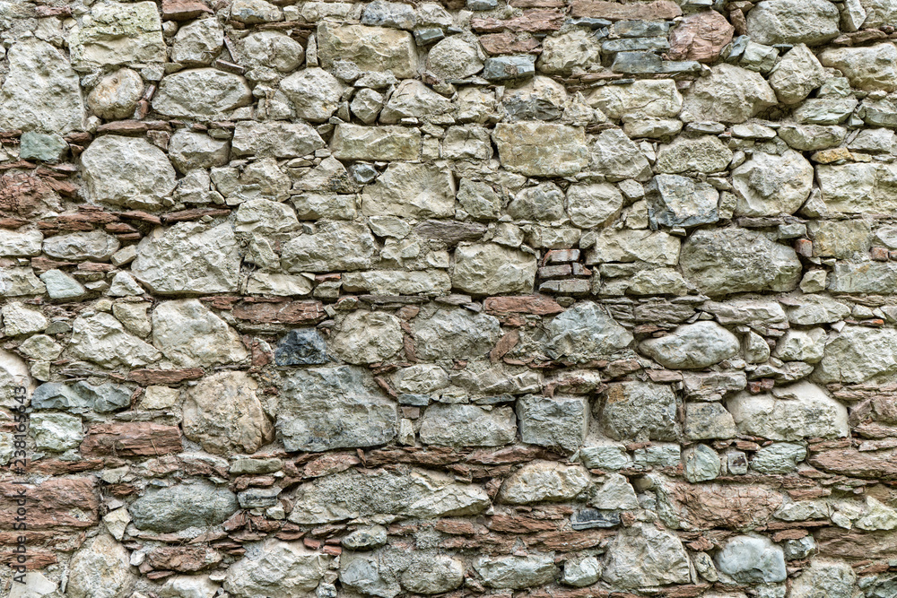 old wall with gray stone blocks

