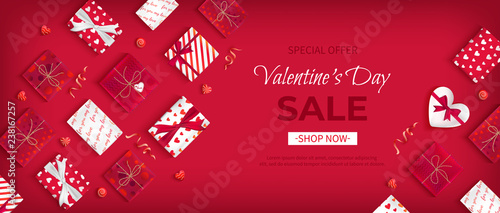Special offer Valentine's Day Sale. Discount flyer, big seasonal sale. Horizontal Web Banner with holiday gift Boxes in different packaging, sweet candy, serpentine on red background. Vector 