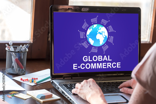 Global e-commerce concept on a laptop screen
