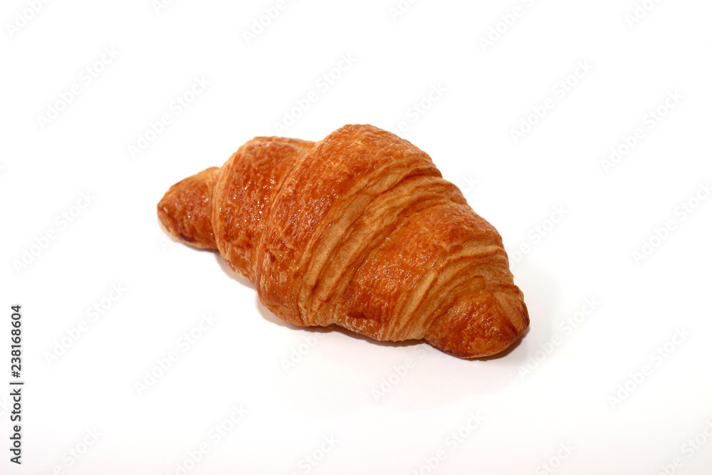 Plain croissant on white background Plain croissant on white background