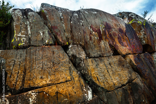 Petroglyphs of the Kalbak Tash complex. Altai, Russia photo