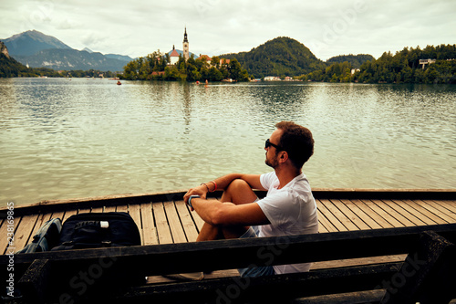 Modern guy enjoying the view in the European city. © Kitja