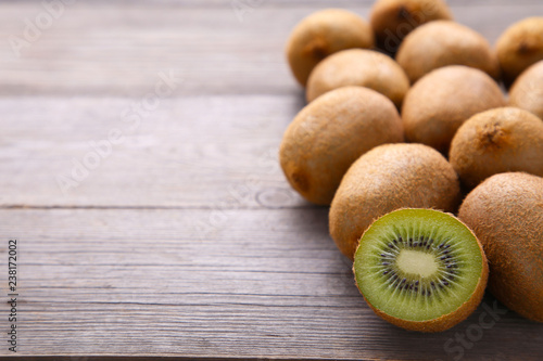 Fresh kiwi fruit on grey wooden background
