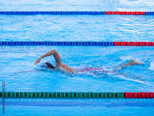 Young man in the swimming.