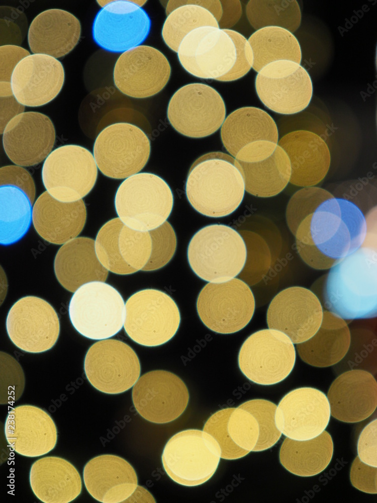 Yellow and blue light dots on the black background Yellow and blue light dots on the black background