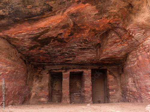 Ancient grave or temple carved from sandstone in Petra Jordan