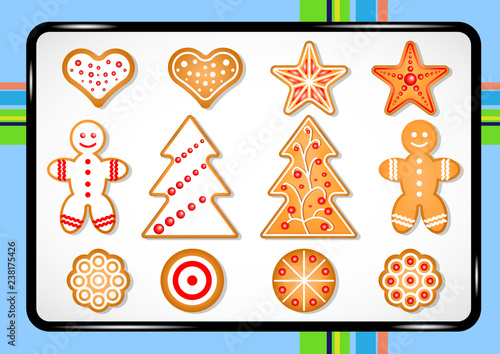 Set of cute gingerbread cookies for christmas on a baking sheet