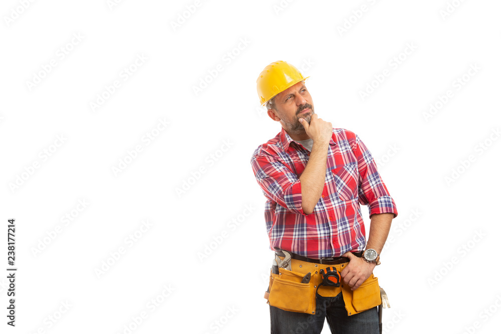 Builder thinking and looking at copyspace. Builder thinking and looking at copyspace.