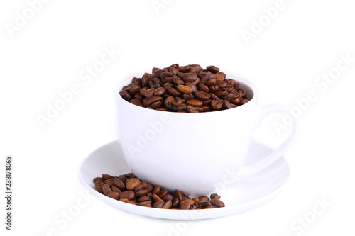Coffee beans in cup isolated on white.
