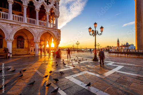 Sunrise view of piazza San Marco, Doge's Palace (Palazzo Ducale) in Venice, Italy. Architecture and landmark of Venice. Sunrise cityscape of Venice. © Ekaterina Belova