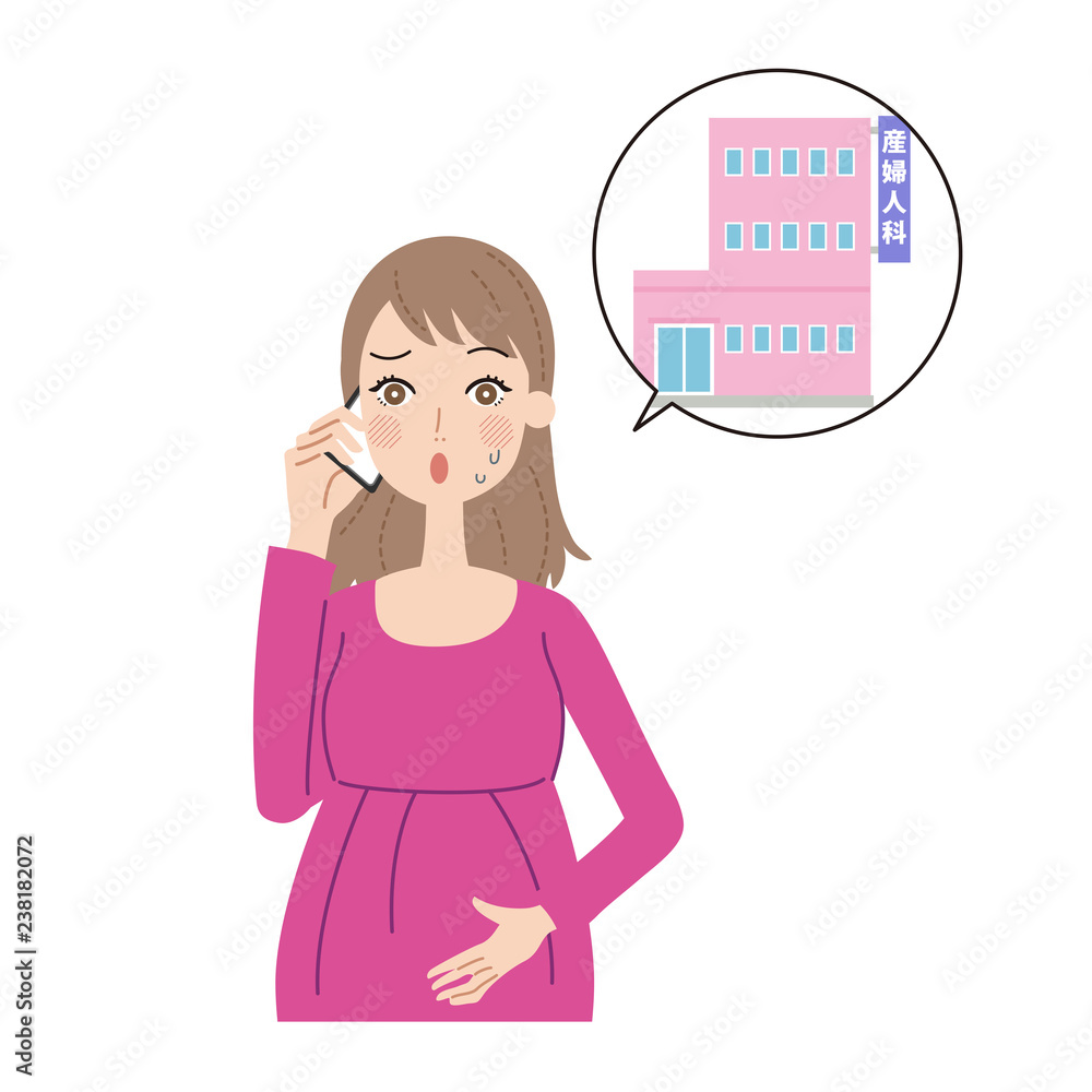 電話をする妊婦 電話をする妊婦