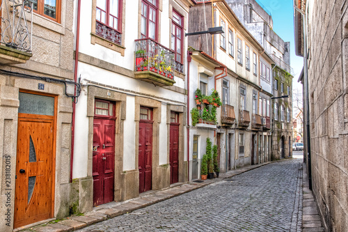 Fototapeta Naklejka Na Ścianę i Meble -  Doorways and Cobblestone, Vila Real, Portugal