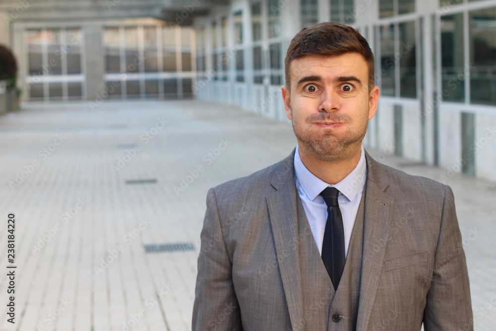 Puffed businessman feeling bloated with copy space Puffed businessman feeling bloated with copy space