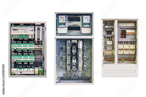 several modern electrical control cabinets of various designs close-up