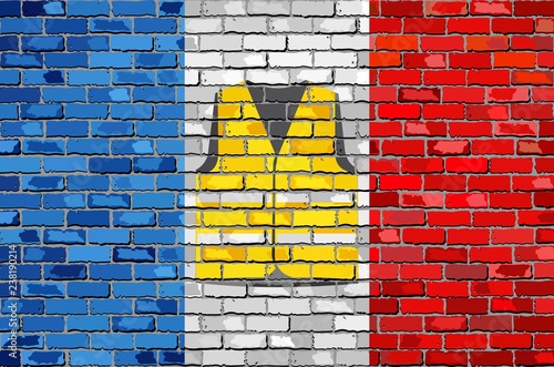 Flag of France with yellow vest on a brick wall - Illustration,
Symbol of the protest movement against the French government