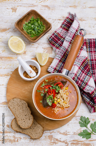 Thick red soup with pasta