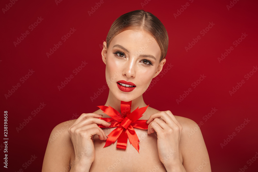 Beauty portrait of a pretty young topless woman
